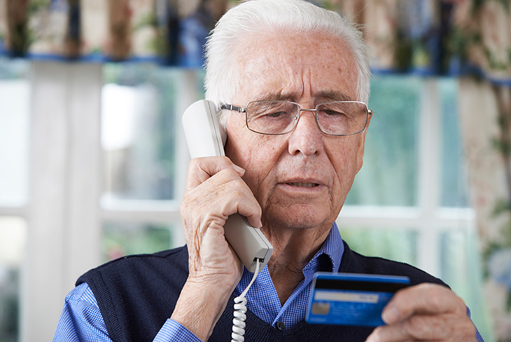 Senior Paying With Credit Card